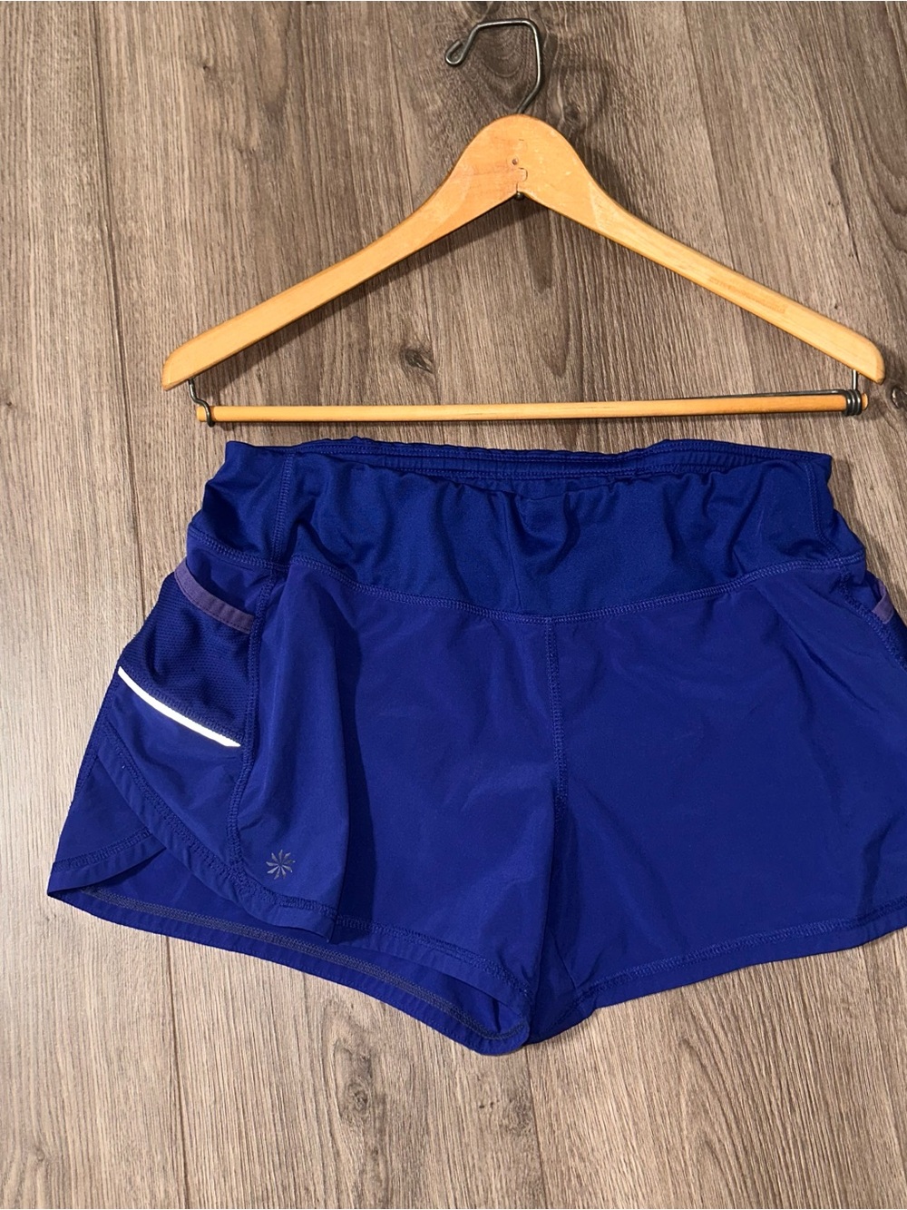 Athleta Deep Blue Athletic Running Shorts Reflective Trim Pockets